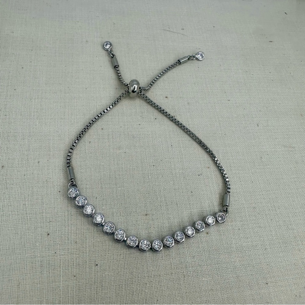 Classic Tennis Silver Tone Adjustable Bracelet with Crystals